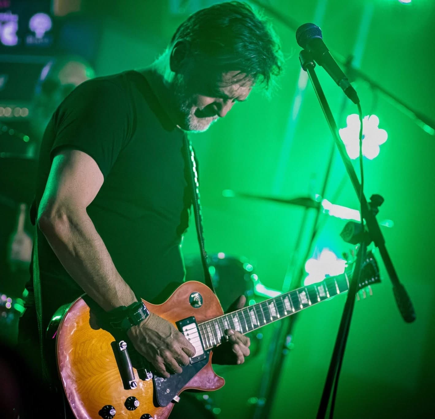 Guitarist with Les Paul, green wash